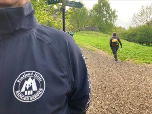 Example of Park Ranger uniform - close up of person showing badge